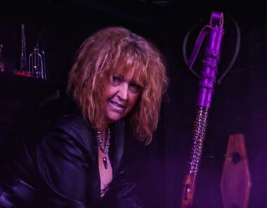 Tees Valley Mistress with cane in northeast dungeon playroom 380x296